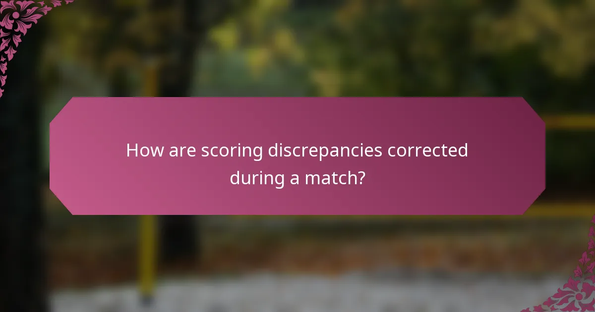 How are scoring discrepancies corrected during a match?